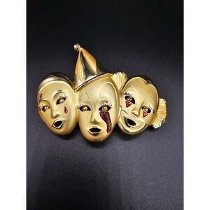 Gold-tone Three Mask Brooch with Red Accent
